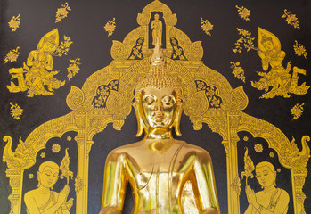 gold buddha on black wall