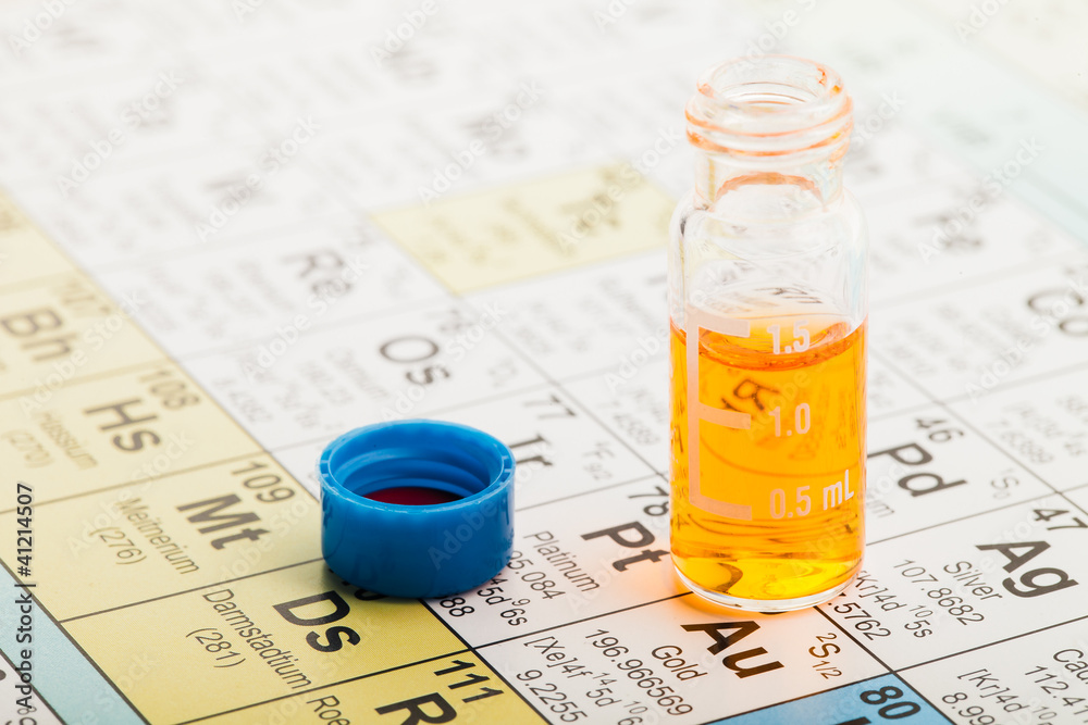 Chemistry: Periodic table and vial Stock Photo | Adobe Stock