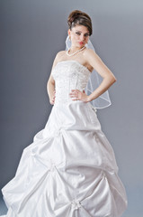 Bride in wedding dress in studio shooting