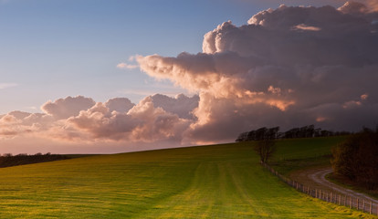 Naklejka na meble Stunning landscape with stormy sky over rural hills