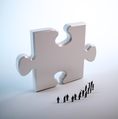 Wall Mural - tiny people looking at a puzzle piece