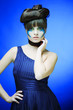 © Raisa Kanareva - brunette with creative make up in blue dress