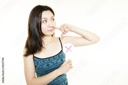 Ngをだし鼻を押さえる女性 Stock Photo Adobe Stock