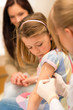 Child vaccination pediatrician apply injection