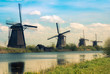 retro postcard with dutch windmills