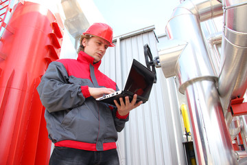 Wall Mural - Industrial worker with notebook