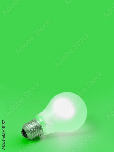 Lighting Lamp On Green Background This Stock Photo And Lighting Lamp On Green Background This Stock Photo And