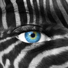 Human face with Zebra pattern - Save endangered species concept