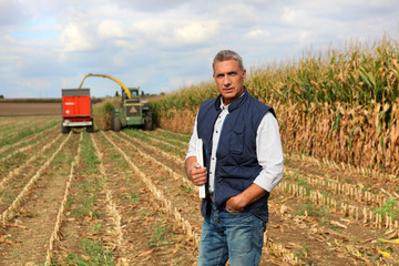 Farmer posing in his field