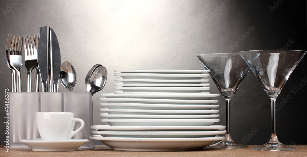 Clean plates, glasses, cup and cutlery