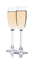 glasses of champagne isolated on a white