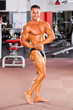© michaeljung - male bodybuilder posing in gym