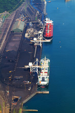 Overhead View Of Ships Loading Coal In Harbour