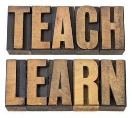 Wall Mural - teach. learn - words in wood type