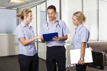 young doctor with two nurses