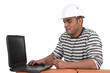 © auremar - Builder sat using laptop