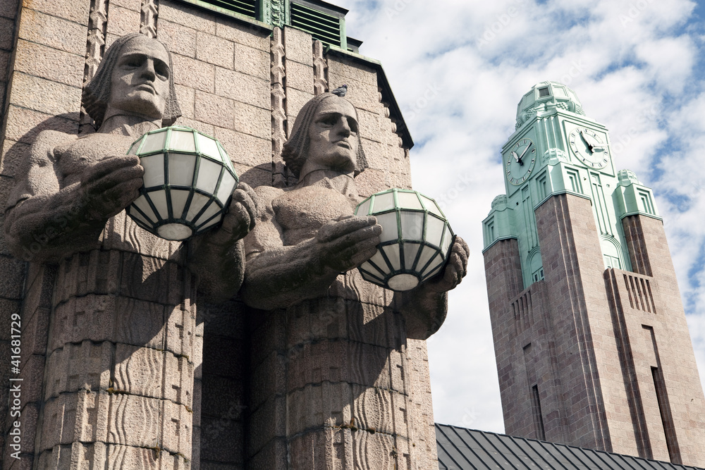 Obraz na płótnie Twins and clock tower in the Helsinki Railway station. Finland. w salonie