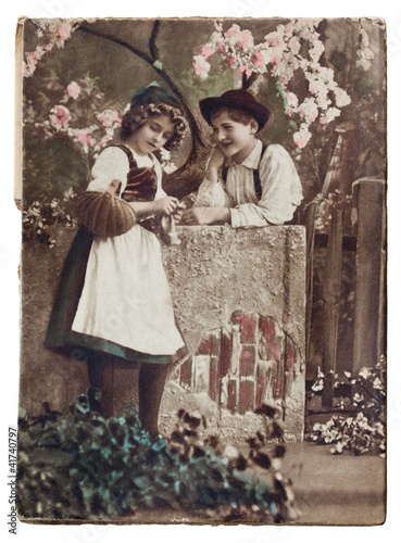 Naklejka dekoracyjna CIRCA 1920.Antique postcard: two children.