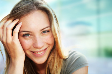 portrait of beautiful blond smiling woman