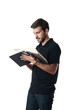 © ibreakstock - Man reading from a large book