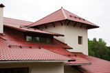Fototapeta Konie - Roof of the house