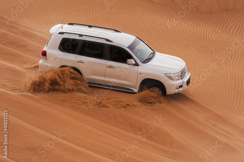 Fototapeta na wymiar car in the desert safari tour