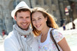 © goodluz - Smiling couple visiting French city in summertime