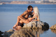 © azazello - Attractive couple at the sea
