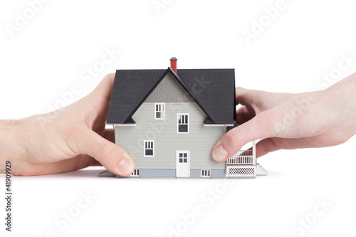 Two hands trying to divide house, isolated Poster Mural XXL