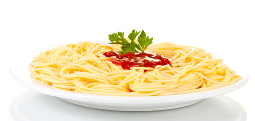 Italian spagetti cooked in a white plate isolated on white