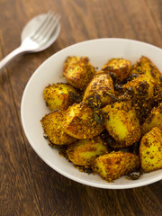 Sticker - close up of a bowl of crusty baked potatoes