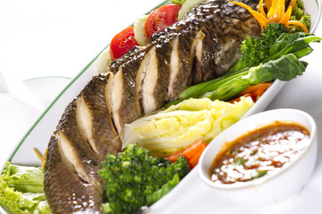 Wall Mural - snake fish, dish of whole snake fish steamed with vegetable