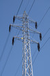 Electric power lines on a blue sky background