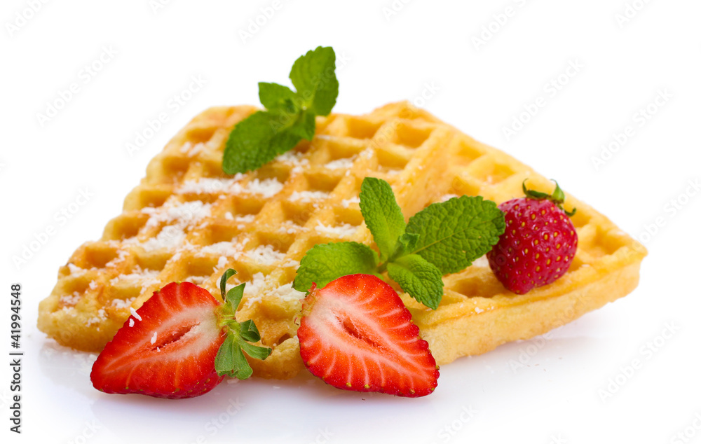 belgium waffles with strawberries and mint  isolated on white