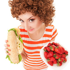 Poster - Fun woman with strawberry and sandwich on the white background