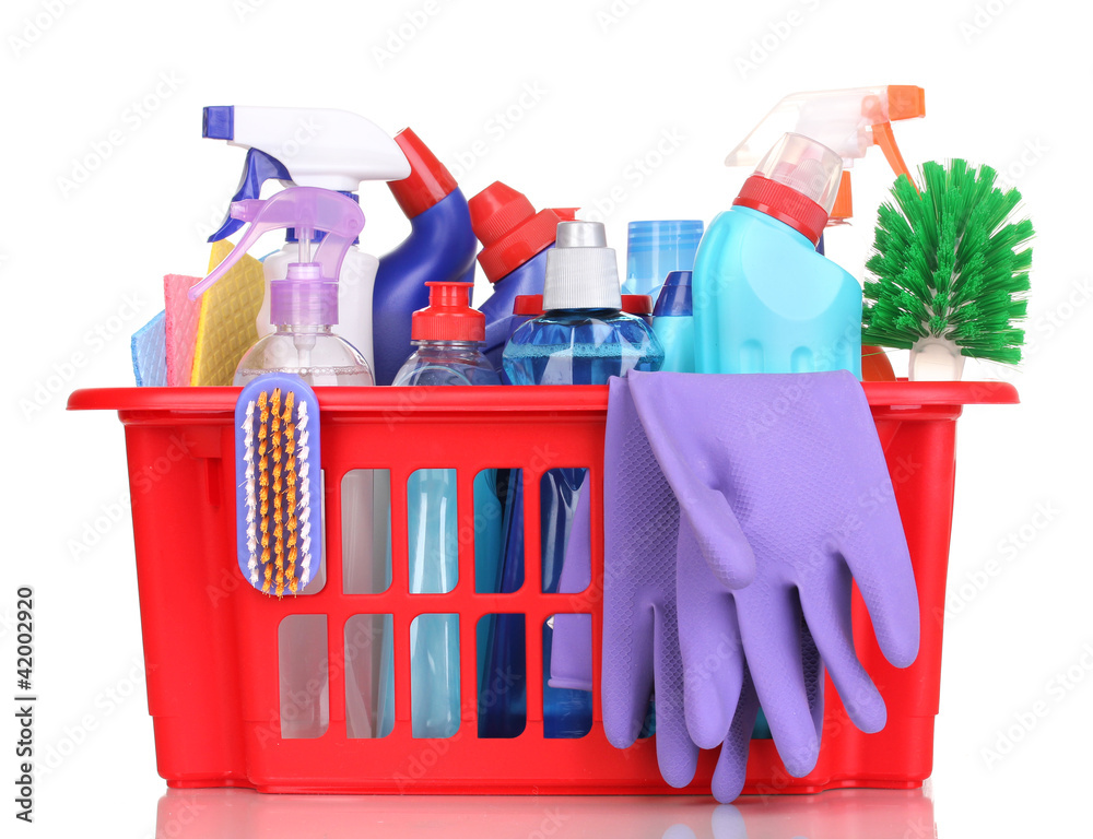 Cleaning items in plastic basket isolated on white