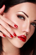 Close-up face of beautiful  woman with red lips.