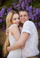 Portrait of young happy smiling cheerful attractive couple toget