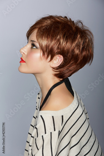 Fototapeta do kuchni woman with short red hair