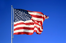 USA American Flag Against Blue Sky