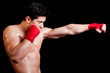 © cristovao31 - Young Boxer fighter over black background