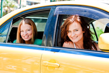 Two women in a taxi