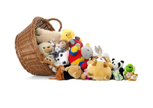 Stuffed Animal Toys In A Basket Isolated On A White Background