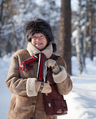 Wall Mural - mature woman in winter park