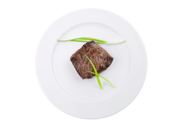 Wall Mural - meat food : roasted fillet mignon on white plate with chives