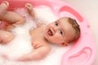 © lamma - Pretty baby in the bath with foam