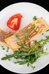 Canvas Print - salmon steaks garnished with tomatoes