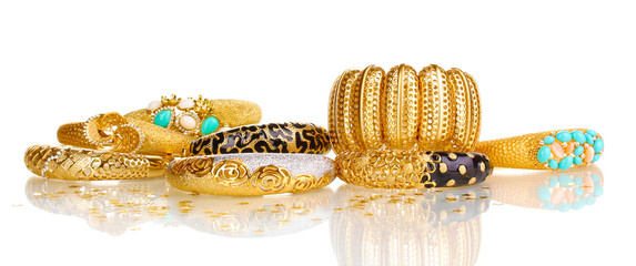 Elegant and fashion golden bracelets isolated