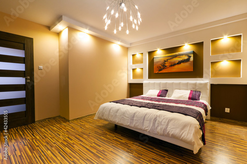Fotografie, Tablou Modern master bedroom interior with picture of shipwreck