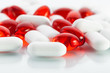 Vitamin pills: Red capsules and white tabs